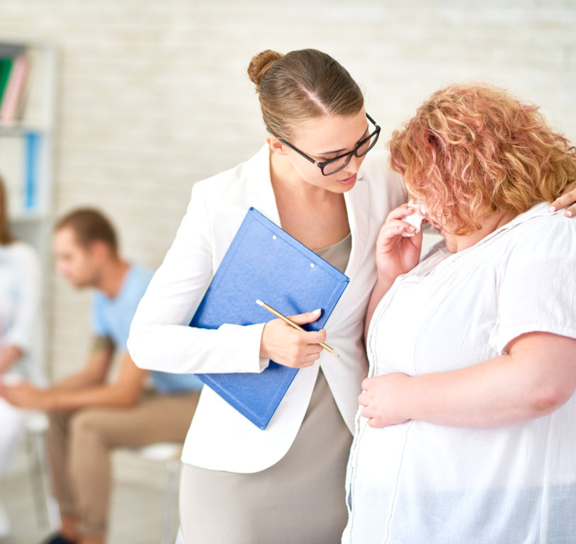 therapist comforting patient