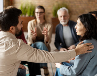 man consoling the woman