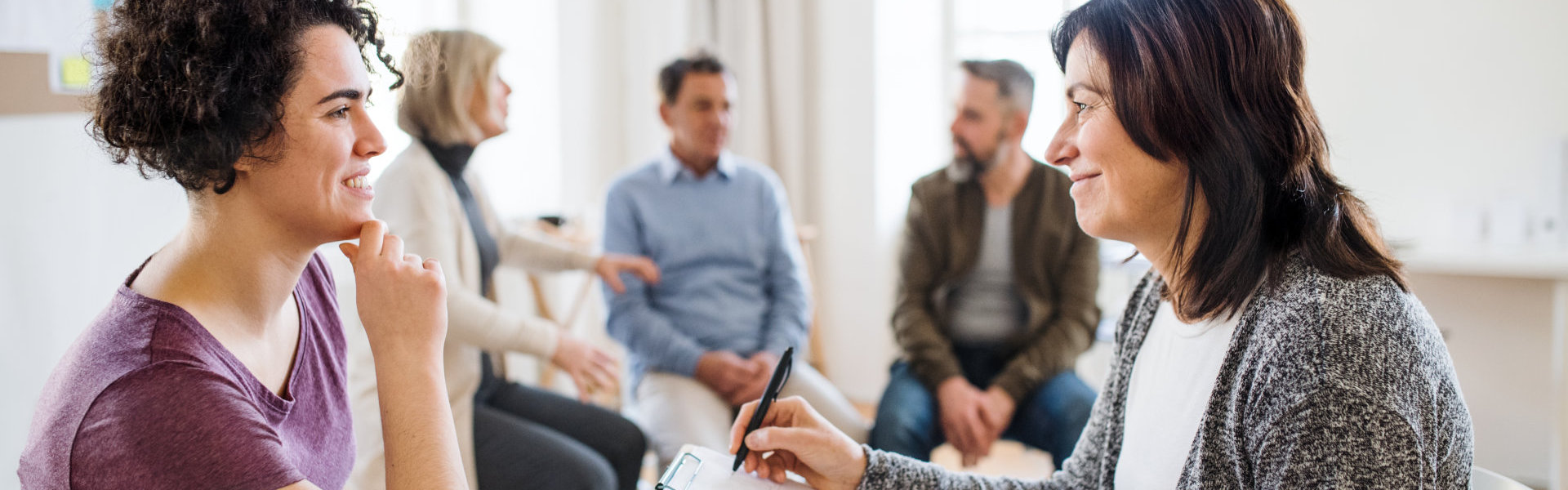counsellor talking to a young woman
