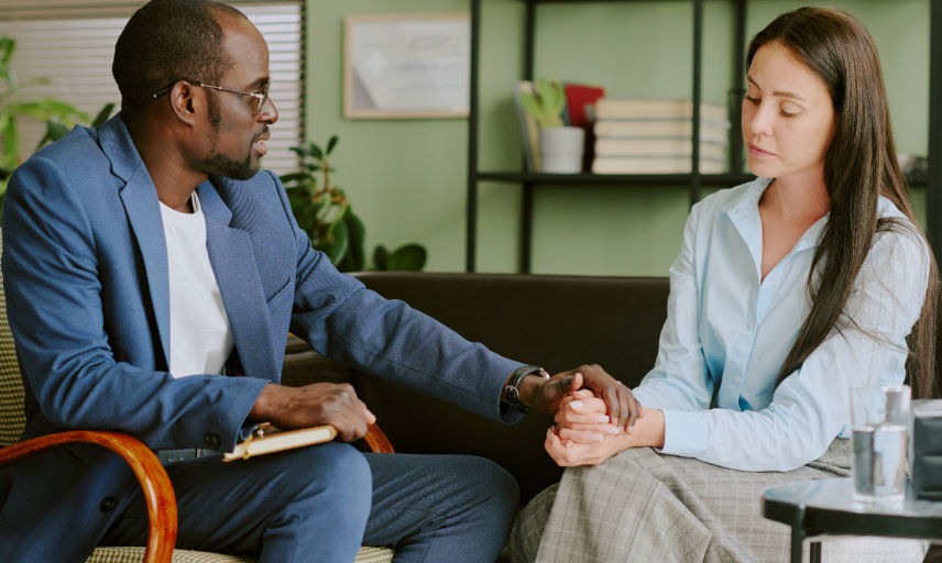 psychiatrist comforting the patient