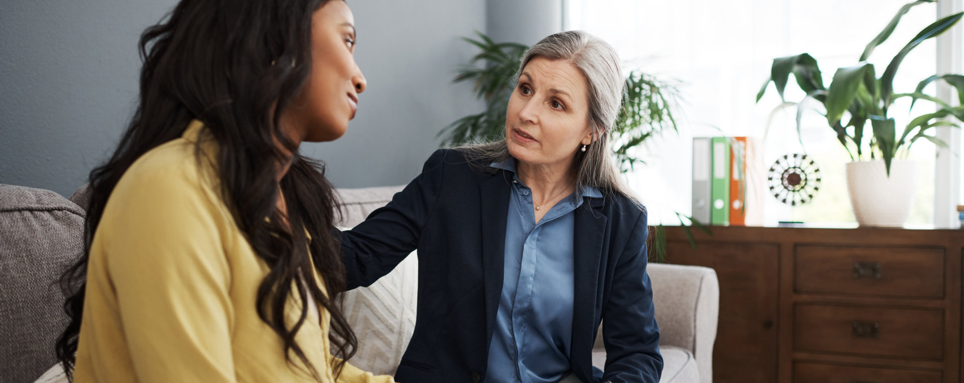 aide and psychiatrist looking at each other
