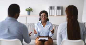 three people talking