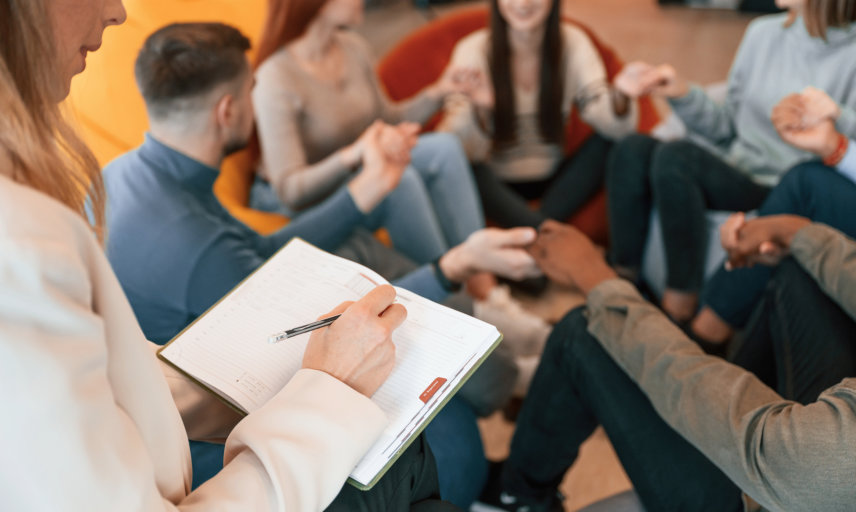 group of people hold together