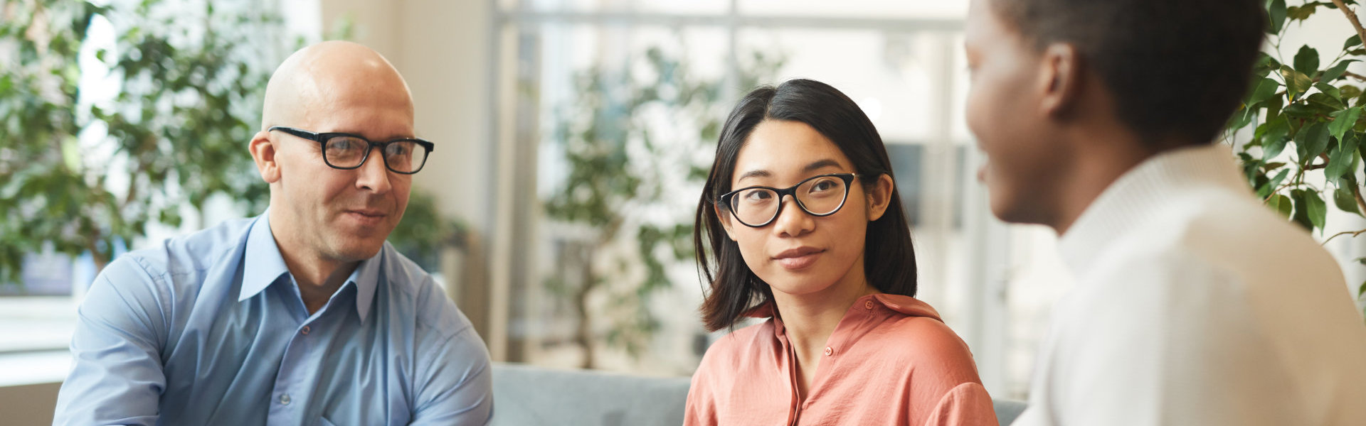three people talking