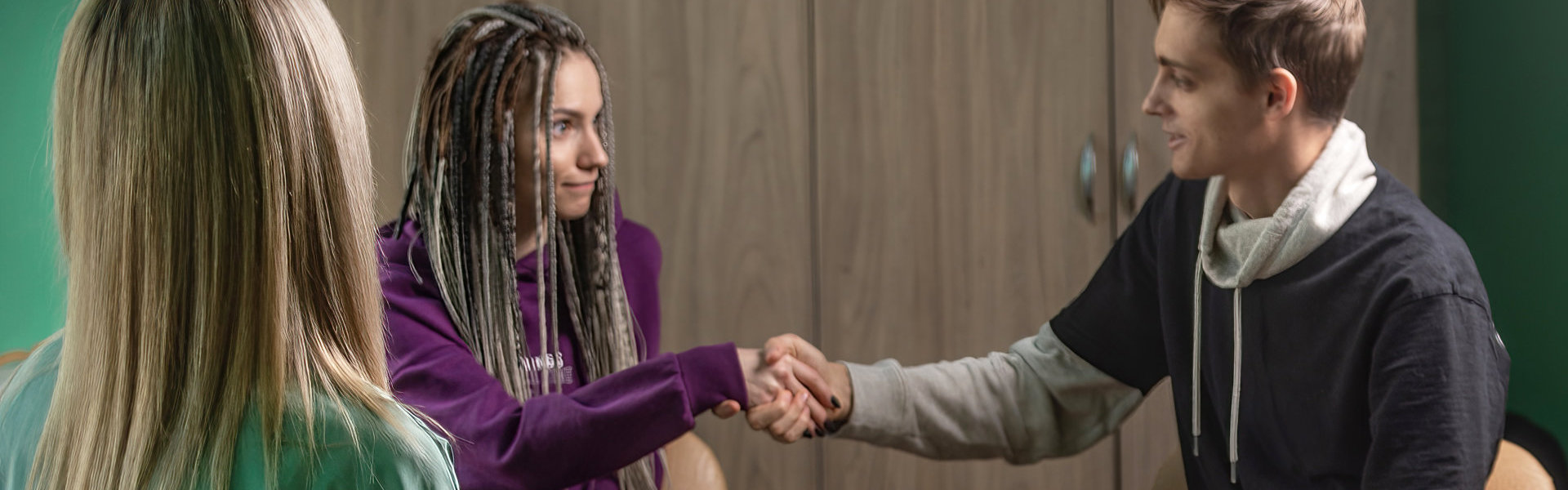 two person shaking hands